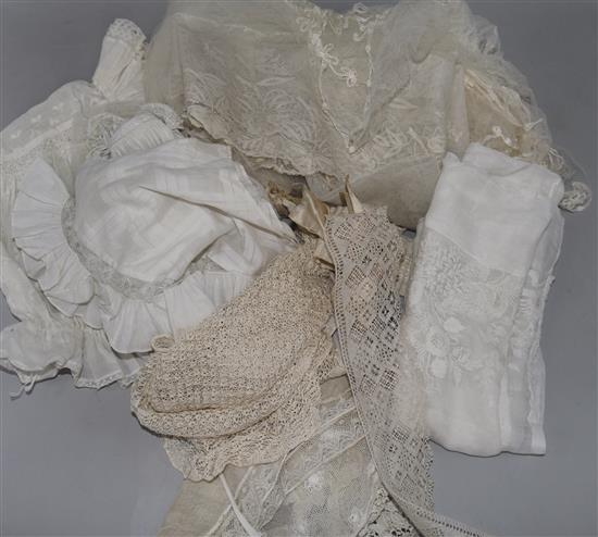 A panel Ayrshire white work and various 19th century laces, bonnets etc